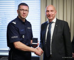 nadinsp. Andrzej Szymczyk i przedstawiciel Interpolu